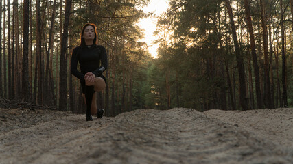 
girl doing sports on the forest trail
