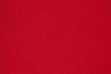 Red fabric cloth texture background close up