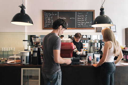 Barista Preparing Coffee For Customer