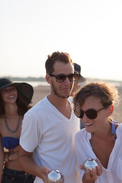 Friends Have Fun With Bocce Game