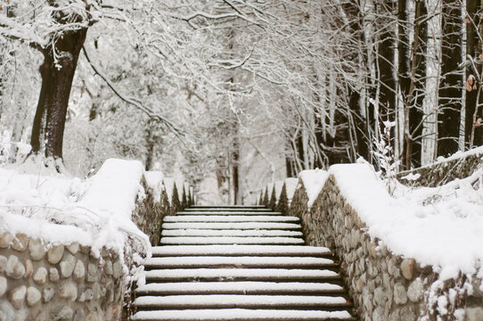 Snowy steps and stone walls