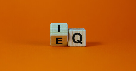 Wooden cubes with changed the expression 'IQ' 'Intelligence Quotient' to 'EQ' 'Emotional...