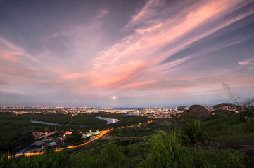 Moonlight in the cloudy cityscape