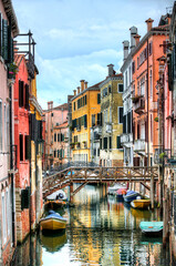 Fototapeta na wymiar Bridges crossing a Canal in Venice