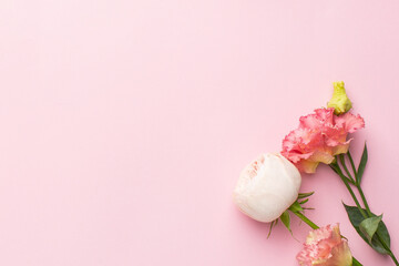 Pink and white flower bouquet on pastel background with copyspace