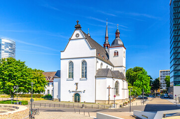 Deutz Abbey Benedictine monastery or Alt Saint Heribert Greek Orthodox church building in city centre, blue sky in sunny summer day background, North Rhine-Westphalia, Germany