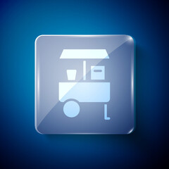 White Fast street food cart icon isolated on blue background. Urban kiosk. Square glass panels. Vector.