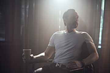 cinematic photo shoot of the confident actor celebrity look in foggy loft room
