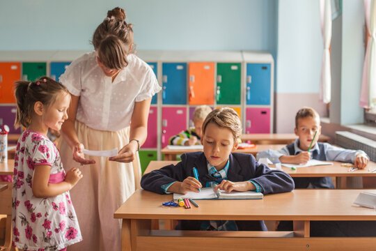 Children and the Teacher in a Classroom