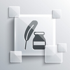 Grey Feather and inkwell icon isolated on grey background. Square glass panels. Vector.