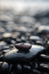 zen stones on the water