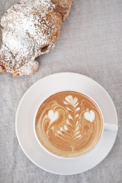 coffee with almond croissant
