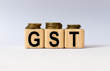 cubes with the word GST on them. Care concept.