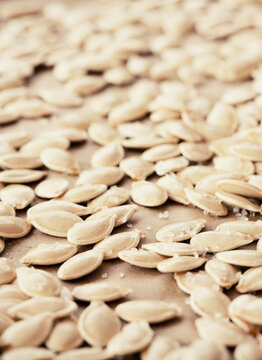 Raw Pumpkin Seeds on Parchement Paper