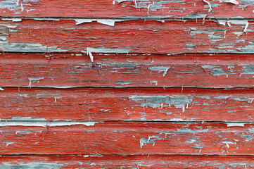 weathered red-painted wall