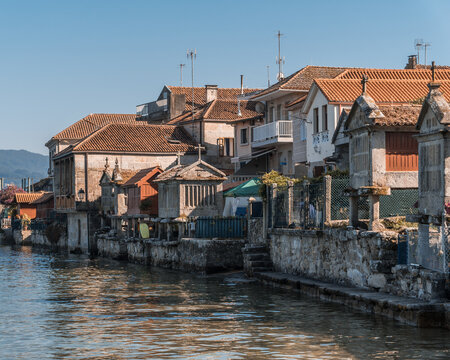 The old town of Combarro has the largest collection of horreos (typical granaries) and Cruceiros (traditional Calvary sculptures) in Galicia, the town is near Sanxenxo, Pontevedra, Spain.