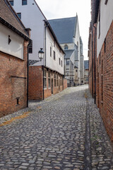 Old narrow street in Leuven, Belgium