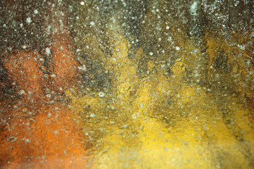 Inside the car wash - organge and red rubber flying