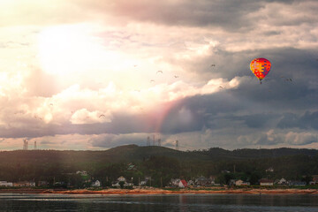 sun at clouds on the bay