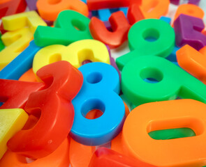 Naklejka premium magnetic numbers on white background