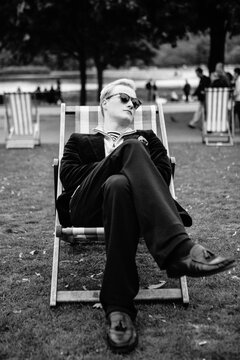 Elegant young man in a park