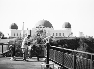 father and son at the observatory