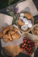 Picnic in the park with sweets and fruits