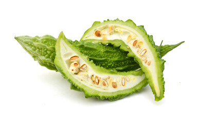 Bitter melon and slice on white background