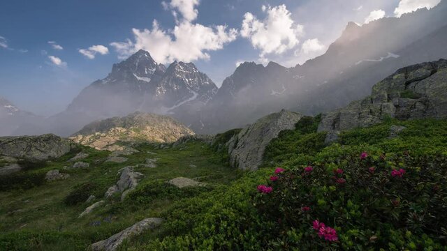 Time lapse of stream flowing over mountain in North of italy, Monviso