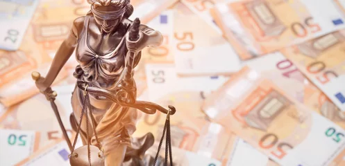 Fotobehang Lady Justice is on several 50 and 20 Euro bills. Concept photo for a lawsuit where a lot of money is at stake. © Tanja Esser