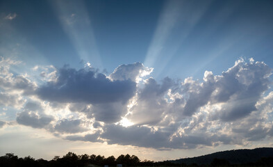 clouds with rays of sunlight in the sky