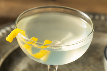 Refreshing Dry Martini with a Lemon Garnish