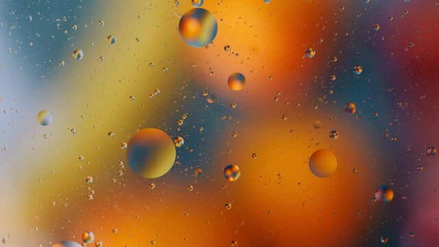 Oil bubbles on colorful background, colorful abstraction 4k