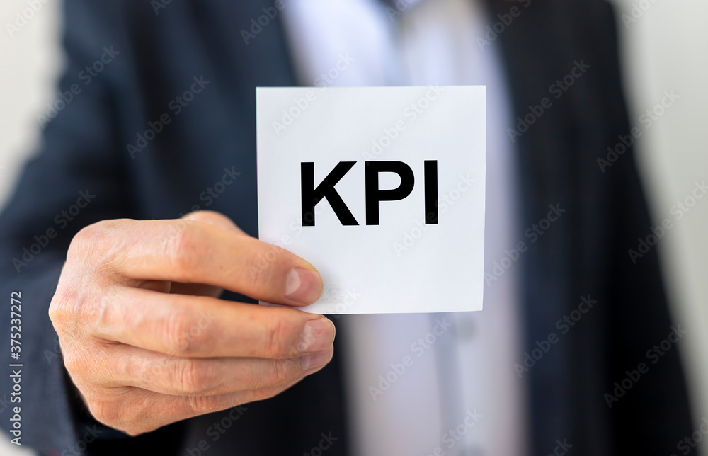 Poster kpi key performance indicator written on paper. business kpi