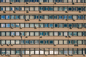 Abstract background - windows of a building in a row, view from front.