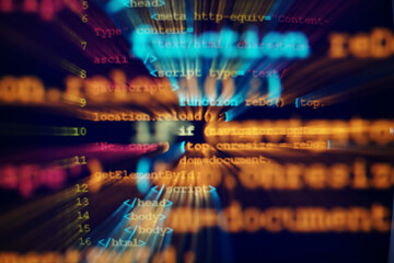 Program code, programming text on monitor.