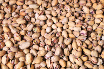 Pistachio nuts as a very effective and beautiful background of natural products.