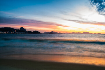 Fototapeta premium Sunrise at Copacabana beach in Rio de Janeiro.
