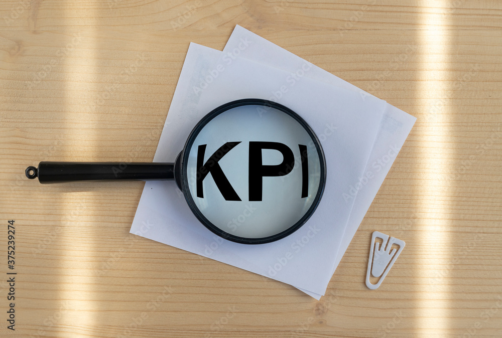 Poster kpi key performance indicator written on paper. business kpi