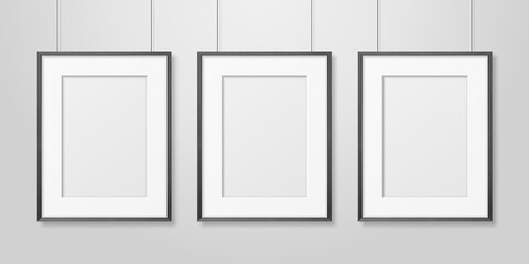 Vector 3d Realistic Three A4 Black Wooden Simple Modern Frame on a White Wall Background. It can be used for presentations. Design Template for Mockup, Front View