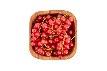 Bowl with red currant berries isolated on white