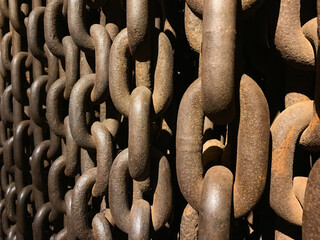 Sunset in the wall of chains