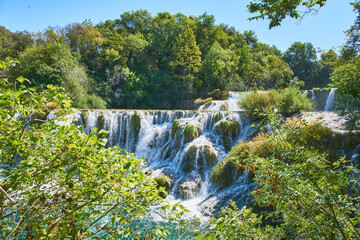 Fototapeta premium Krka national park in Croatia - lush green forest, waterfalls