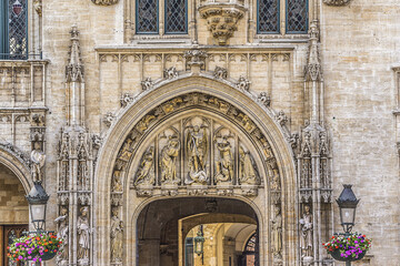 Architectural fragment of Town Hall (Hotel de Ville) on Grand Place (Grote Markt), Brussels central square - most important tourist destination and most memorable landmark in Brussels, Belgium. 