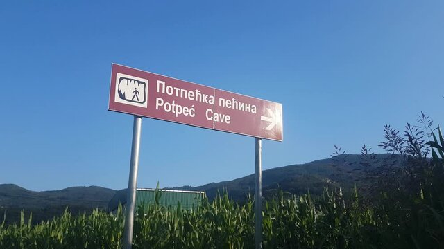 Potpec Cave, Serbia. Road Sign With Direction to Natural Beauty and Landmark