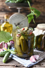 Salted cucumbers. Spices and herbs for making pickles on wooden background
