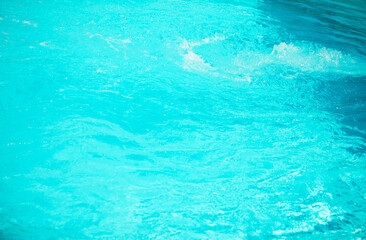 surface of blue swimming pool,background of water in swimming pool.
