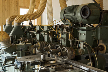 industrial background - a fragment of a machine for making wall panel