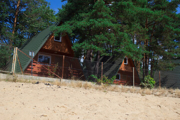 Holiday houses on the beach. Summer landscape. Resort. Vacation. Background.