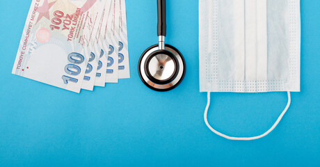 Turkish liras, mask and stethoscope